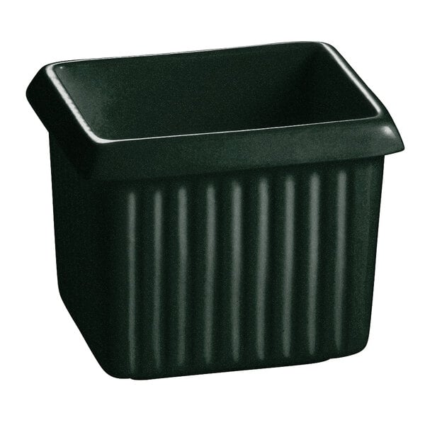 A hunter green rectangular container with ridges.