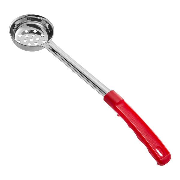 A metal spoon with a perforated bowl and a long red handle.