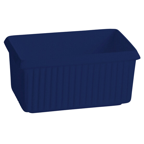 A blue rectangular cast aluminum server with ridges.