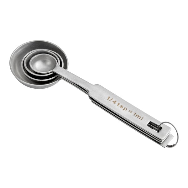 A set of four nested stainless steel measuring spoons held together by a metal ring.