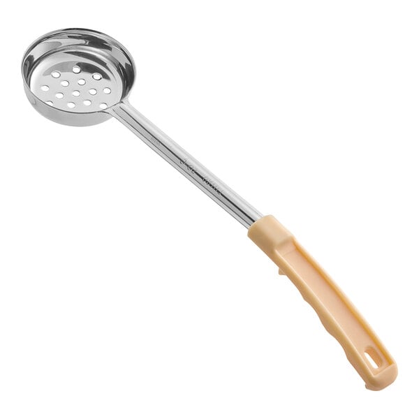 A metal perforated spoon with a round bowl and an ivory-colored handle.