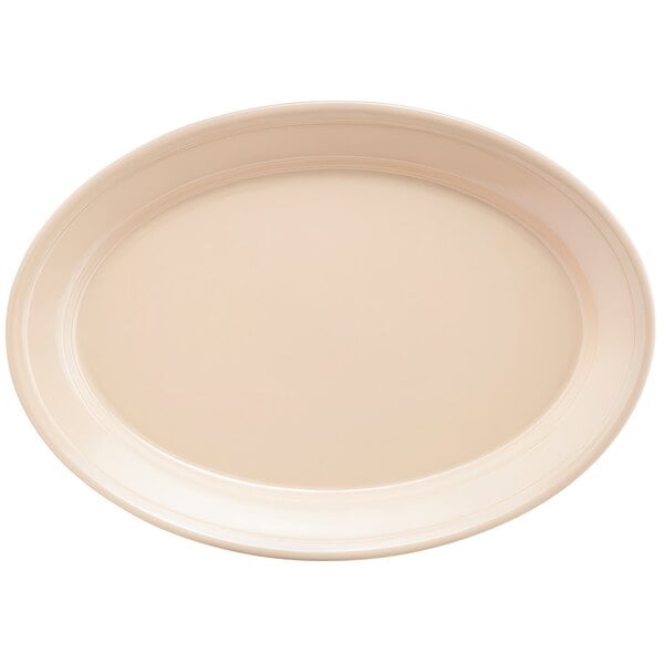 A tan oval platter with a white rim.