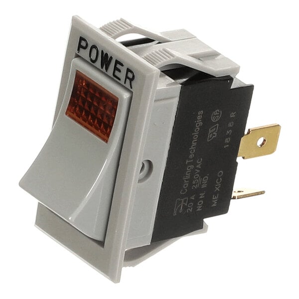 A plastic rocker power switch with an amber indicator light.