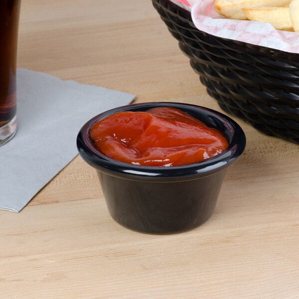 Carlisle 4312203 Black 2 oz. Smooth Plastic Ramekin - 48/Case