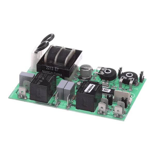 A programmed timer circuit board with various electronic components mounted on it.