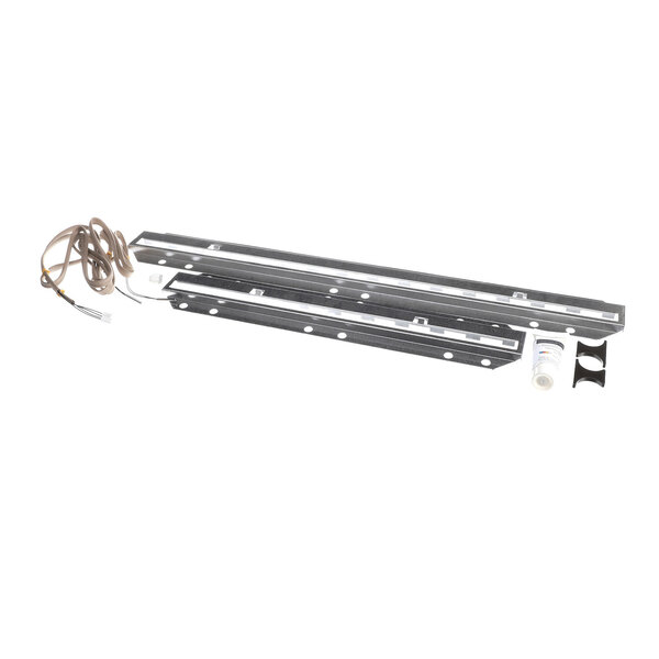 A temperature sensor service kit with two metal strips, wiring, and small accessory components.