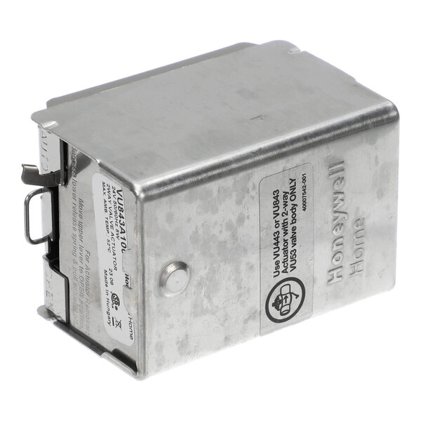 A metal Honeywell Home valve actuator module.