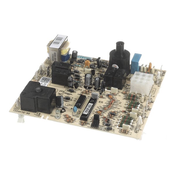 A Trane CNT04717 ignition control circuit board with various electronic components mounted on it.