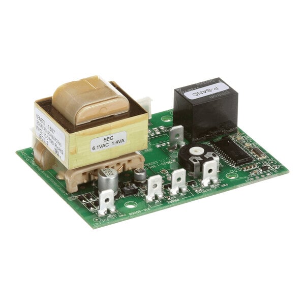 A green electronic controller circuit board with various components, including a transformer and relay, used in Ultrafryer Systems.