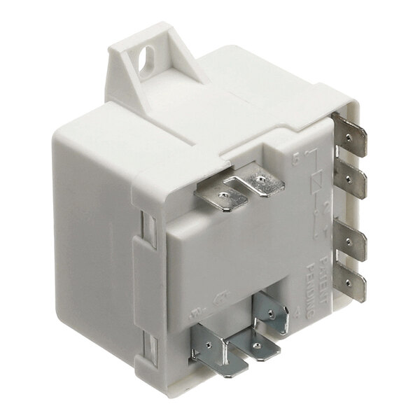 A white electrical relay with multiple metal prongs, used as a start relay for Copeland compressors.