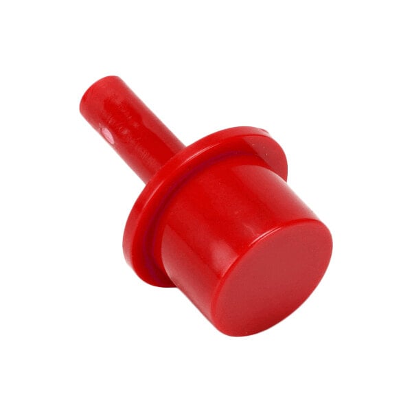A red plastic push button component.