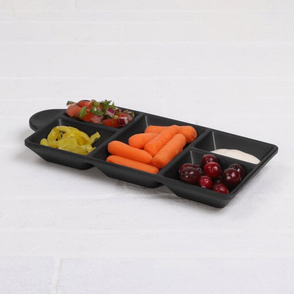An Elite Global Solutions black melamine tray with different vegetables and fruits in it.