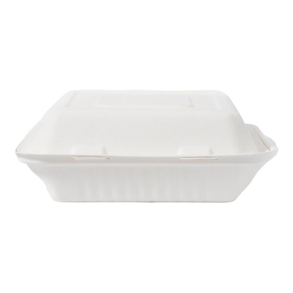 A white compostable clamshell take-out container made from sugarcane fiber.