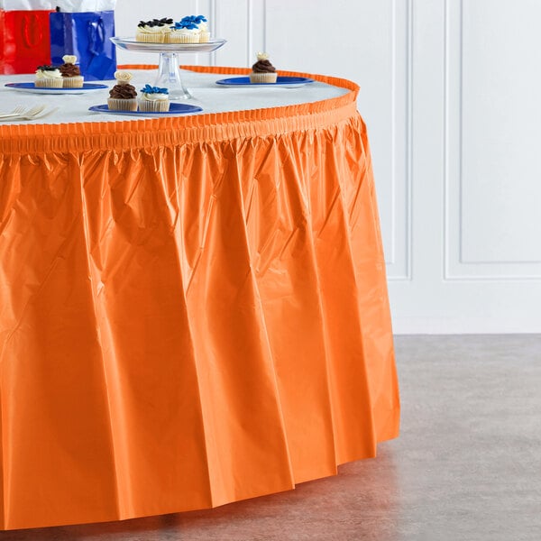 Creative Converting 14' x 29" Sunkissed Orange Disposable Plastic Table Skirt - 6/Case