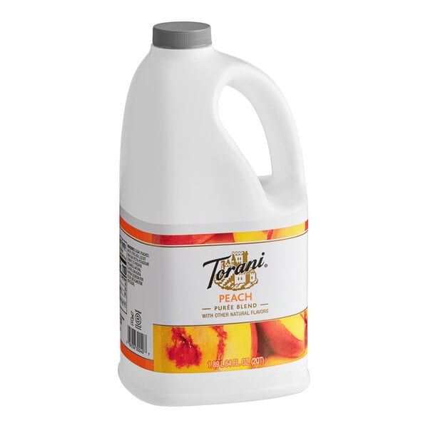 A 64 fl. oz. bottle of Torani Peach Puree Blend with a handle and a gray cap.