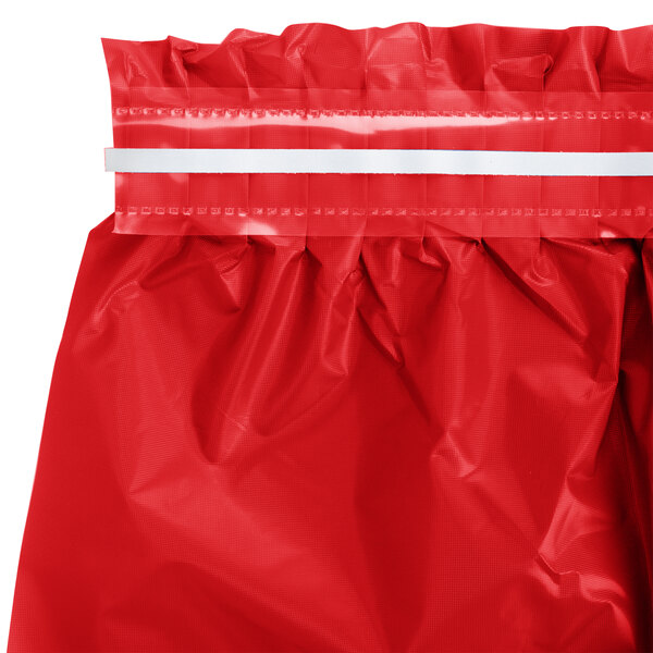 A classic red disposable plastic table skirt with a pleated design and adhesive strip at the top.