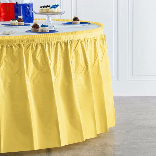 Creative Converting 14' x 29" Mimosa Yellow Disposable Plastic Table Skirt - 6/Case