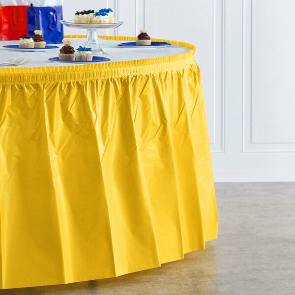 Creative Converting 14' x 29" School Bus Yellow Disposable Plastic Table Skirt - 6/Case