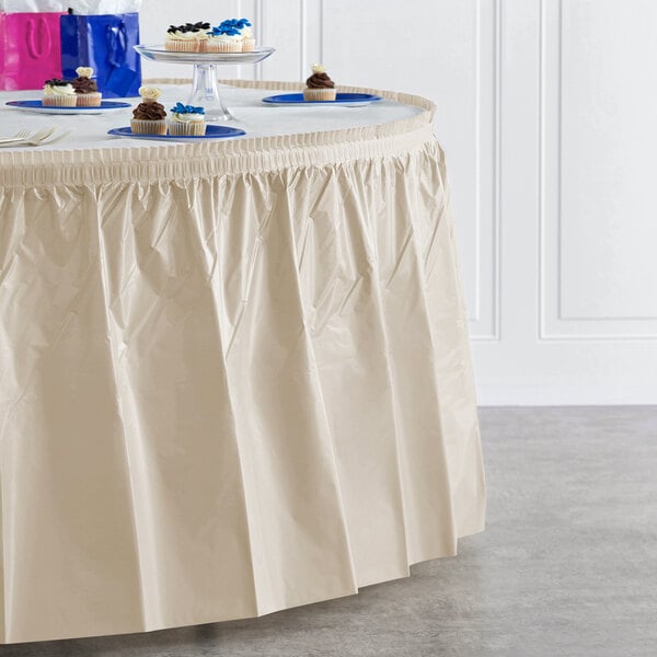 Creative Converting 14' x 29" Ivory Disposable Plastic Table Skirt - 6/Case