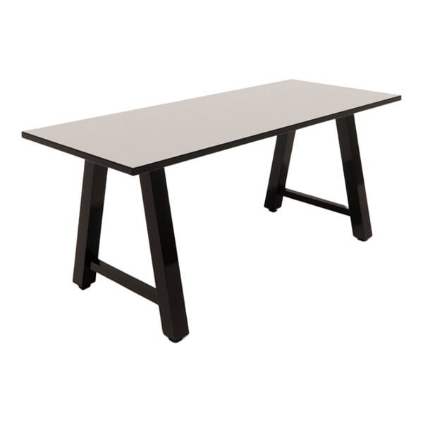 A rectangular table with a white laminate top and black angled legs.