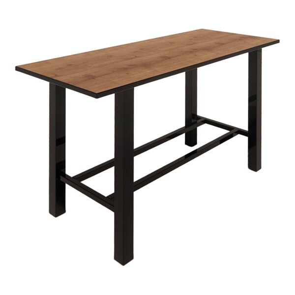 A rectangular bar height table with a planked urban oak laminate top and black metal legs.