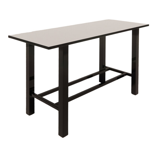 A rectangular bar height table with a white laminate top and black legs.