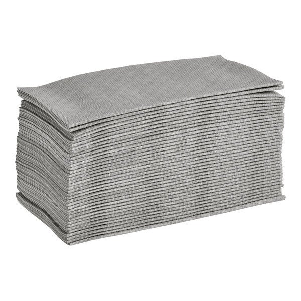 A stack of gray, linen-feel disposable dinner napkins folded in a rectangular shape.