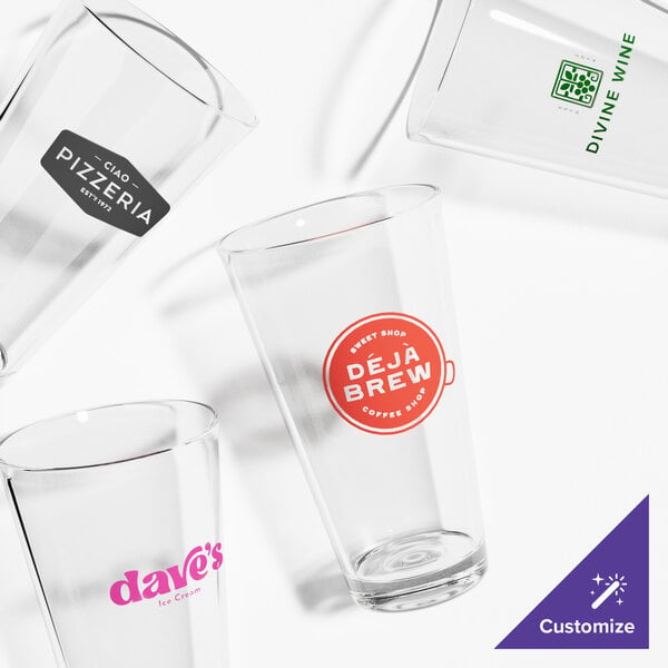 A set of clear 14 oz. rim tempered mixing glasses, each with customizable printed logos.