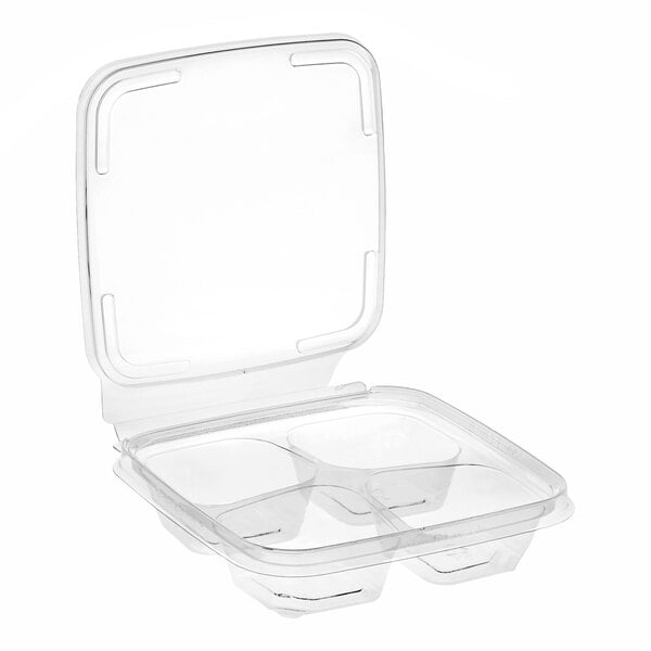 A clear plastic square snack container with four compartments and a hinged lid.