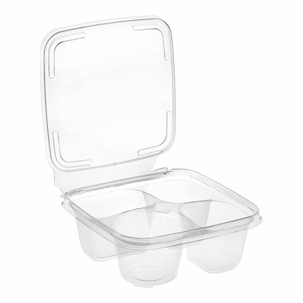 A clear plastic square snack container with four deep compartments and a hinged lid.