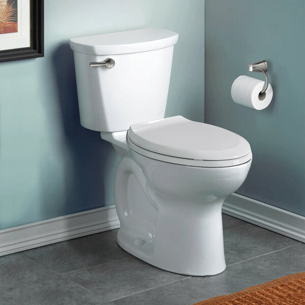 A white floor-mount elongated toilet with a high-efficiency tank and chair height design.