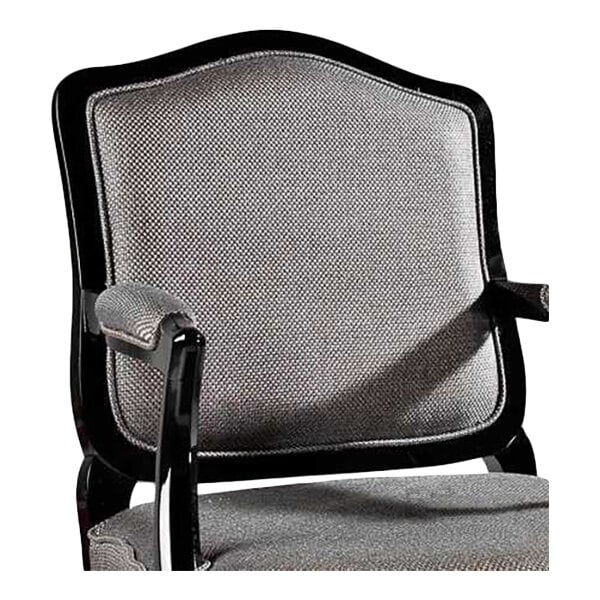 A gray fabric guest arm chair with a black wooden frame.