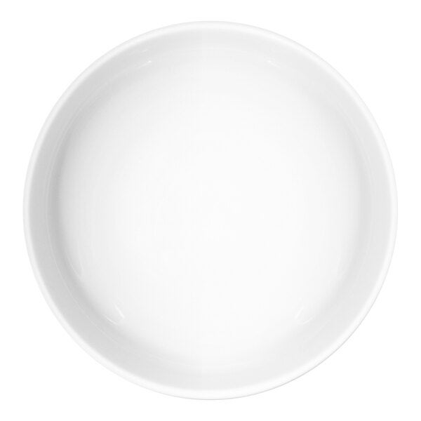 A plain white round porcelain plate.