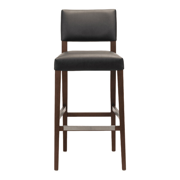 A dark brown beech wood bar stool with a black faux leather seat and backrest.