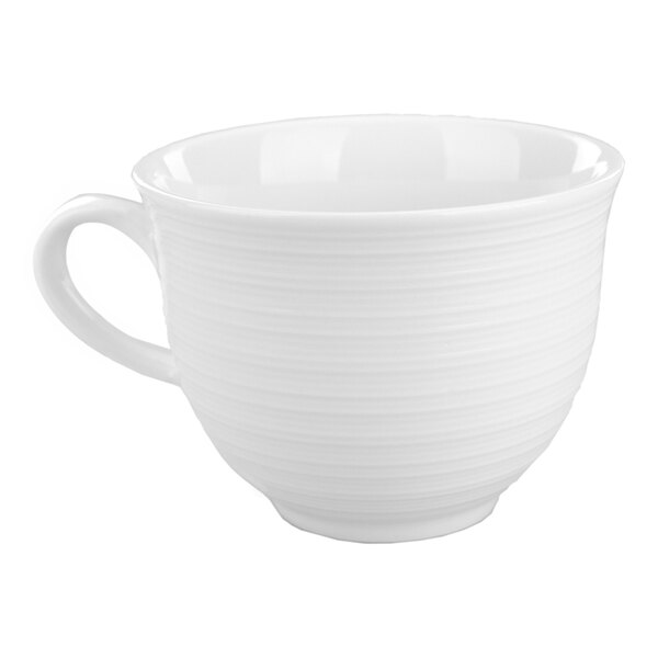A white porcelain cup with a handle and a subtle textured pattern.