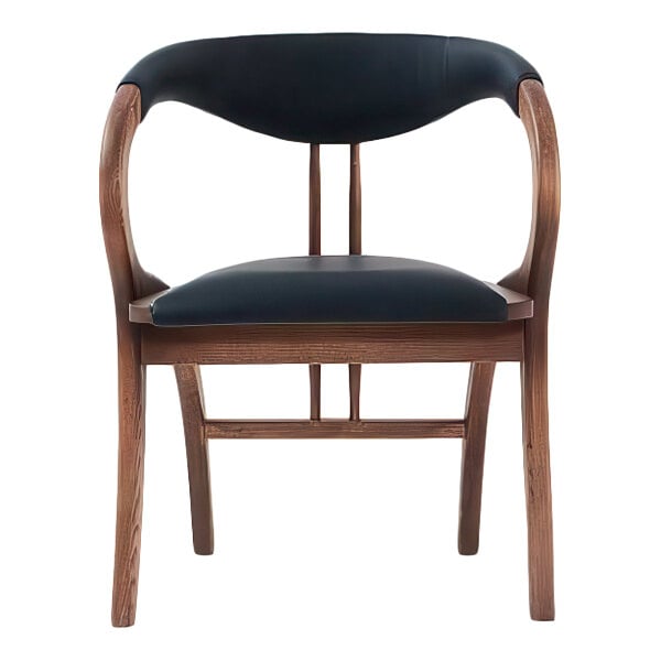 A black faux leather arm chair with a natural wooden frame.