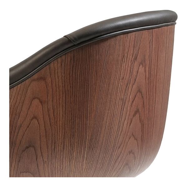 A gray faux leather bubble arm chair with a rounded black wooden frame.