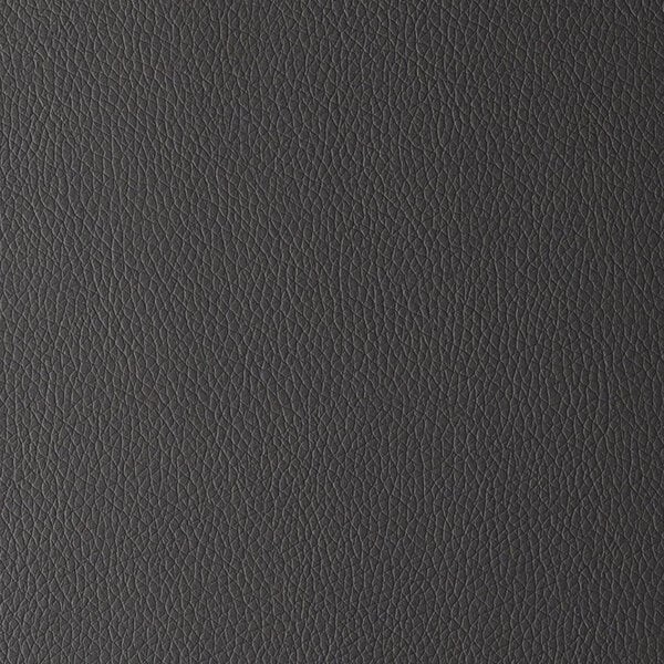 A close-up view of gray faux leather upholstery with a textured, pebbled surface.