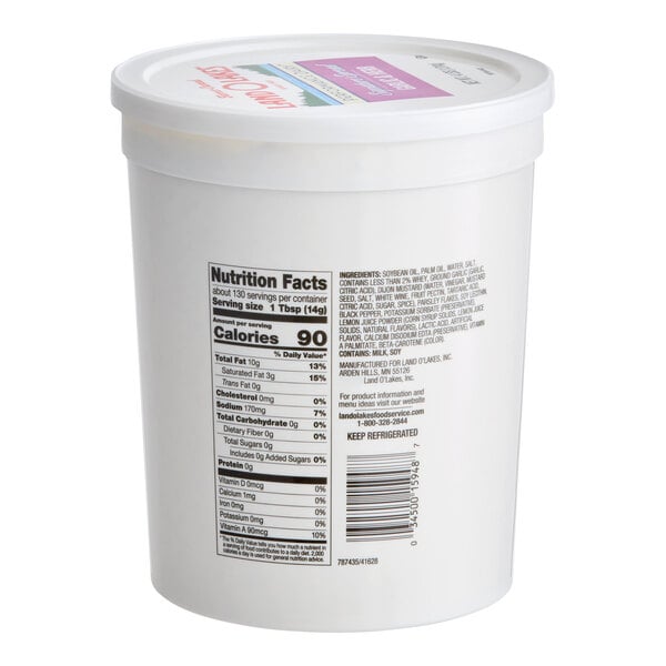 A white plastic tub of Land O Lakes Performance Dairy Signature Spread Garlic & Herb.