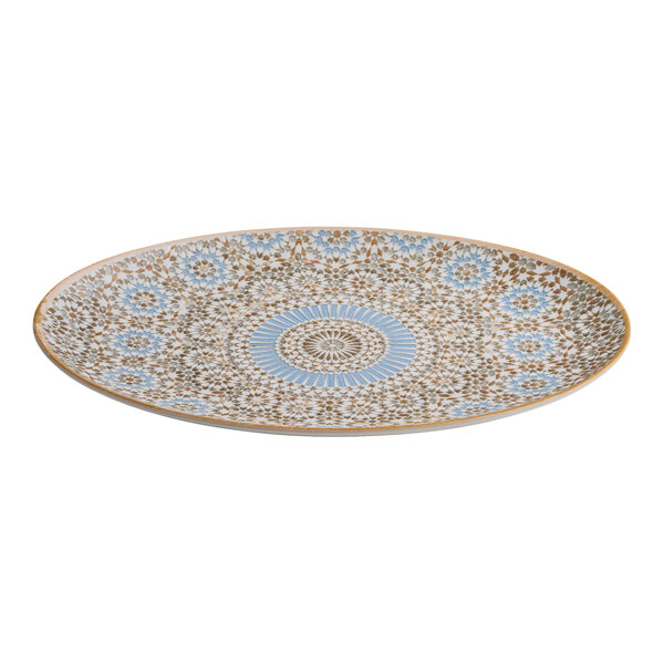 An oval blue and orange porcelain platter featuring a radial geometric design.