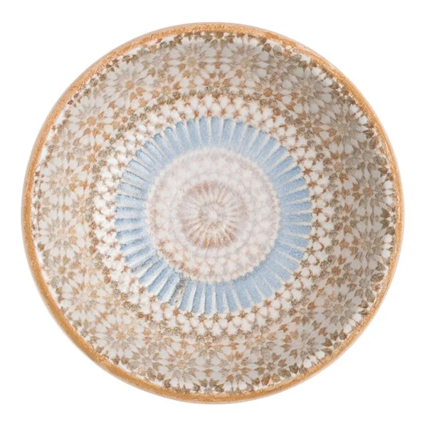 A round blue porcelain ramekin with a radial geometric design.