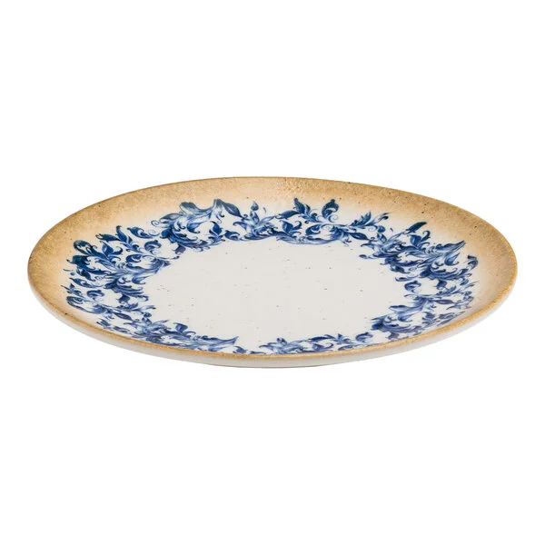 A round white porcelain plate with a blue floral edge and a tan rim.