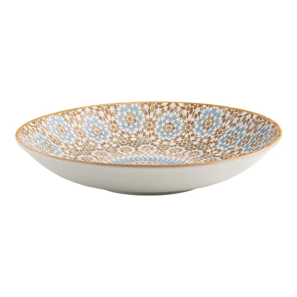 A round porcelain deep coupe plate with a blue and orange radial geometric design on the interior.