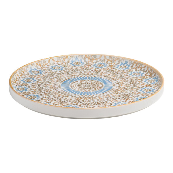 A round porcelain plate with a raised rim featuring a blue and orange intricate pattern.
