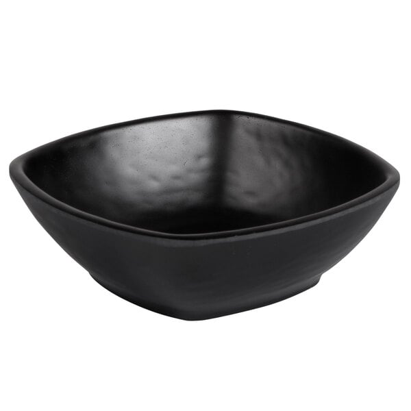 An Elite Global Solutions black melamine square bowl with a black rim.