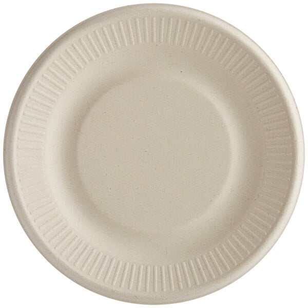 A round, beige compostable plant fiber plate with a ripple edge design.
