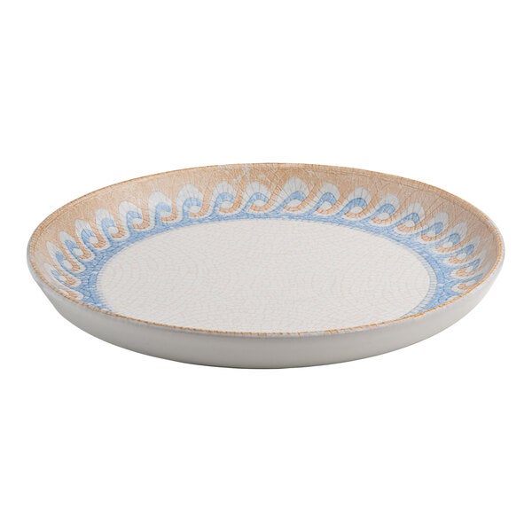 A round white porcelain flat coupe plate with a blue and tan wave design around the rim.