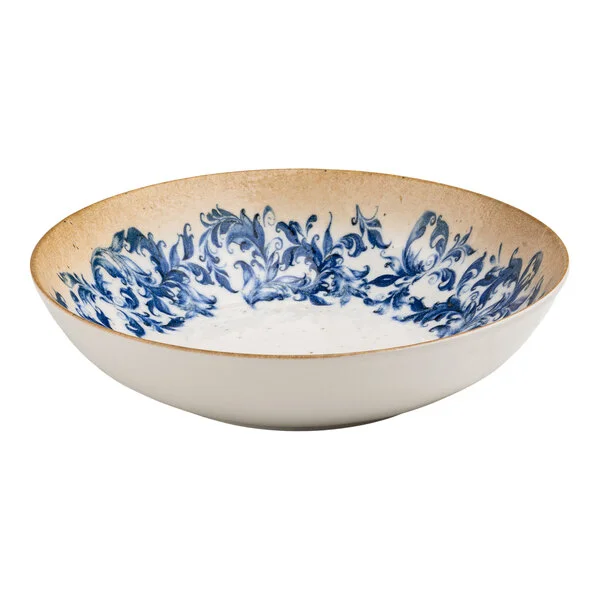 A round white porcelain deep coupe plate with a blue floral center and a tan rim.