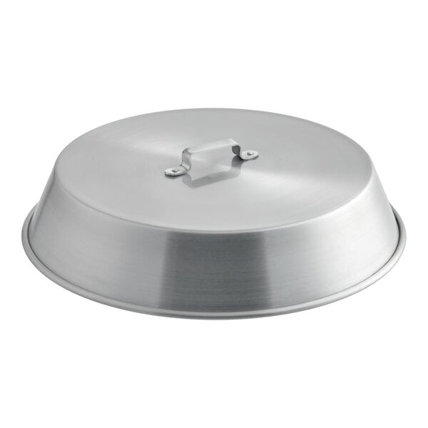 A round, metallic lid with a handle on top, likely made of aluminum.