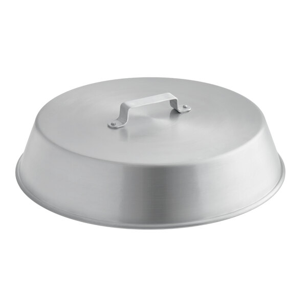 A round, metallic lid with a handle on top, likely made of aluminum.